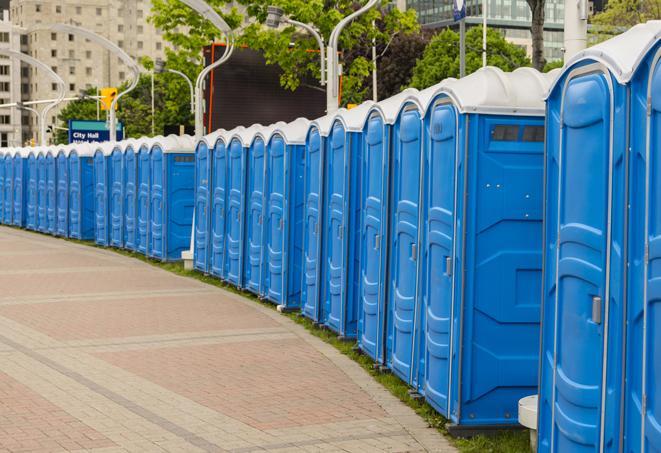 outdoor restroom setup for a special event, with sleek and modern portable restrooms in Dixon